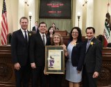 Assemblyman Rudy Salas helped to honor Kings Coounty's Mary Gonzales=Gomez as Woman of the Year.
